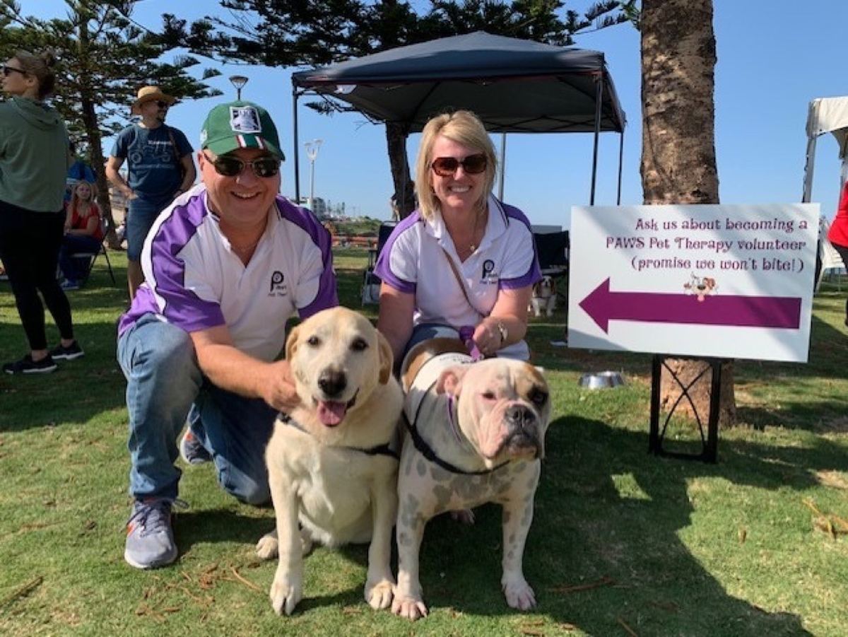 PAWS volunteers at their information stall in the community
