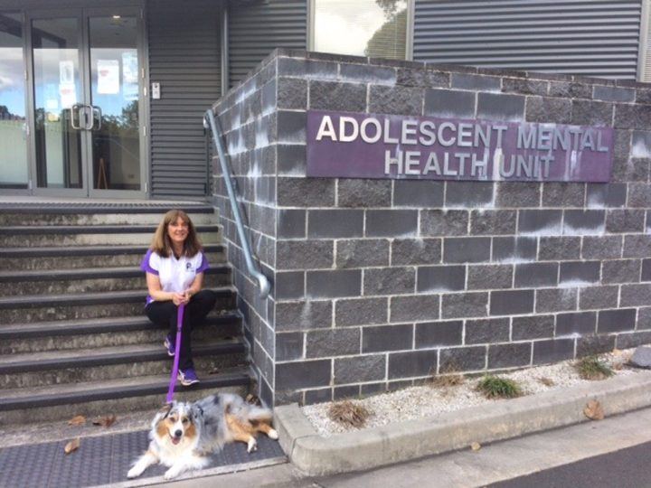 A PAWS team outside an adolescent health centre