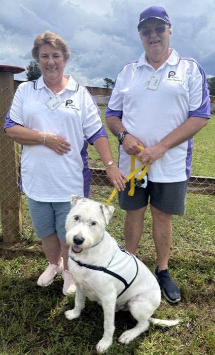 Gary, Kerrie & Bailey, a PAWS volunteer team